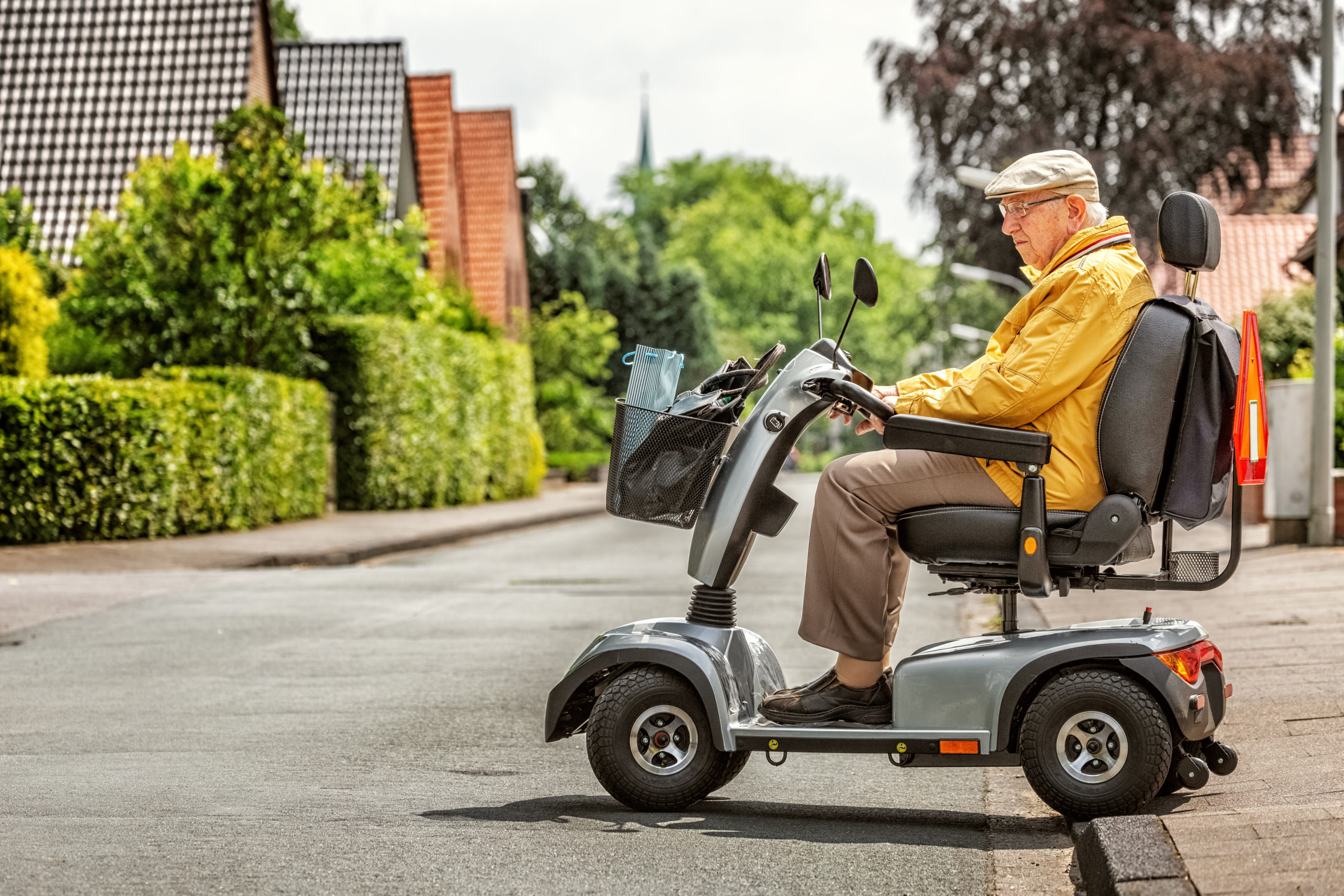 An,Elderly,Person,Drives,An,Electric,Vehicle Electric Mobility New